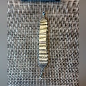 Intricate Silver Bracelet with Geometric Engraved Design